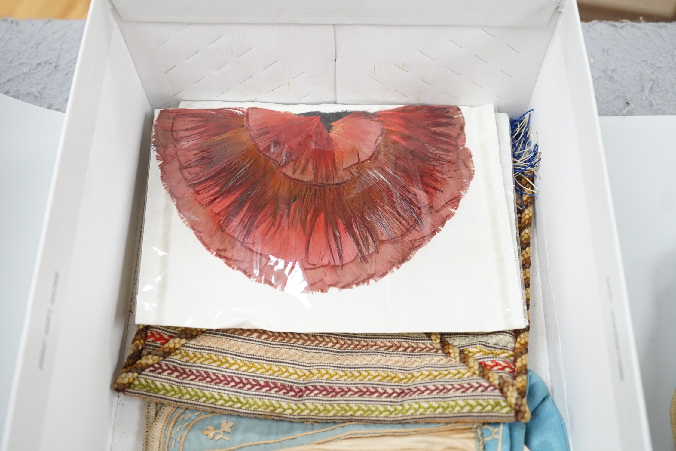 A collection of 19th and early 20th century crochet, embroidered and beaded reticules, evening bags and bible bags